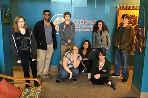 The group poses for a picture at Exodus Refugee Immigration on Community Day.