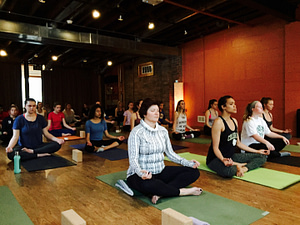 Meditation is an important component of a yoga practice, and out yoga outreach group experienced it during their class at Blooming Life Yoga + School.